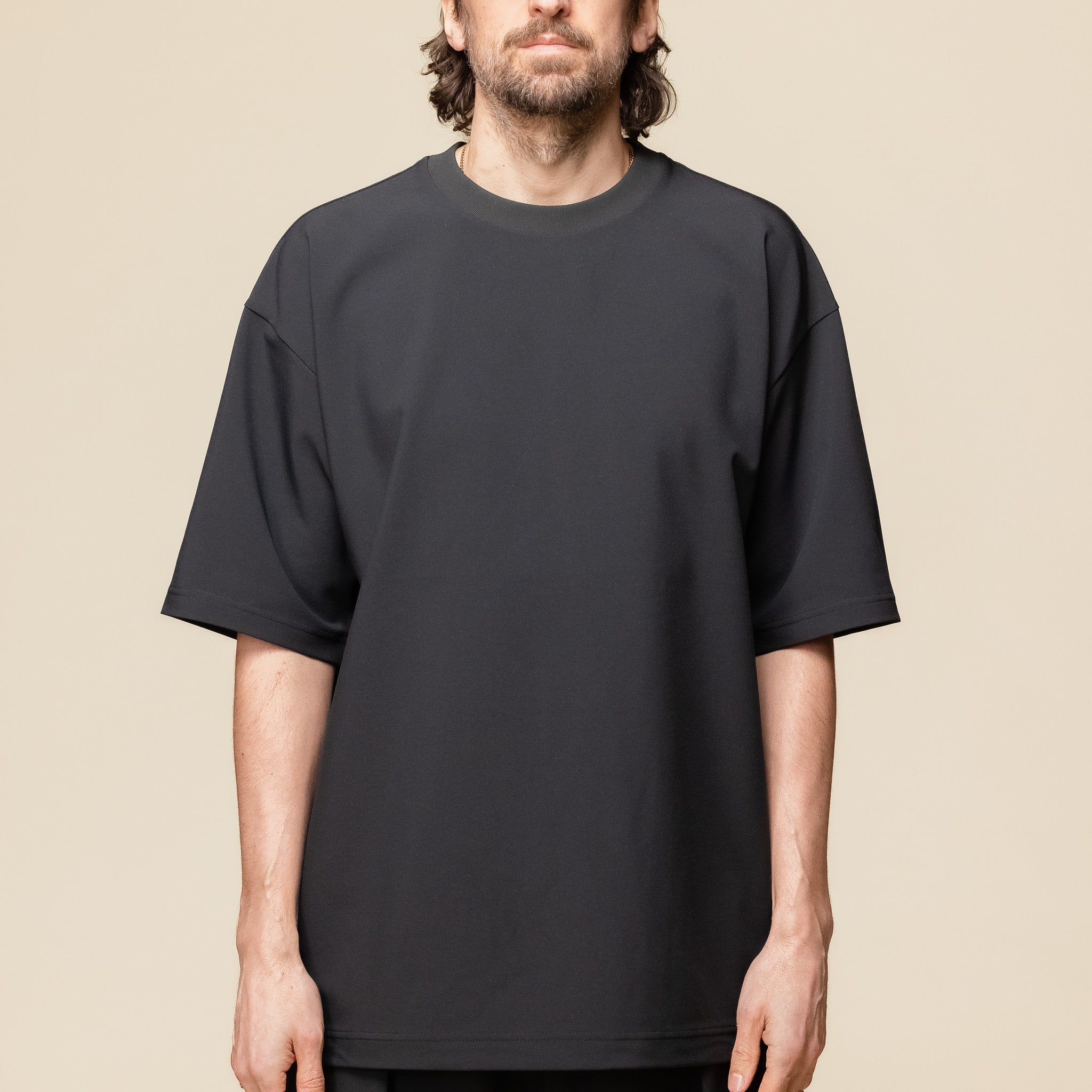 DLMXGA52U Descente IO - Tech Half Sleeve T-Shirt - Black "descente I/O" "descente allterrain" "descente t-shirt"
