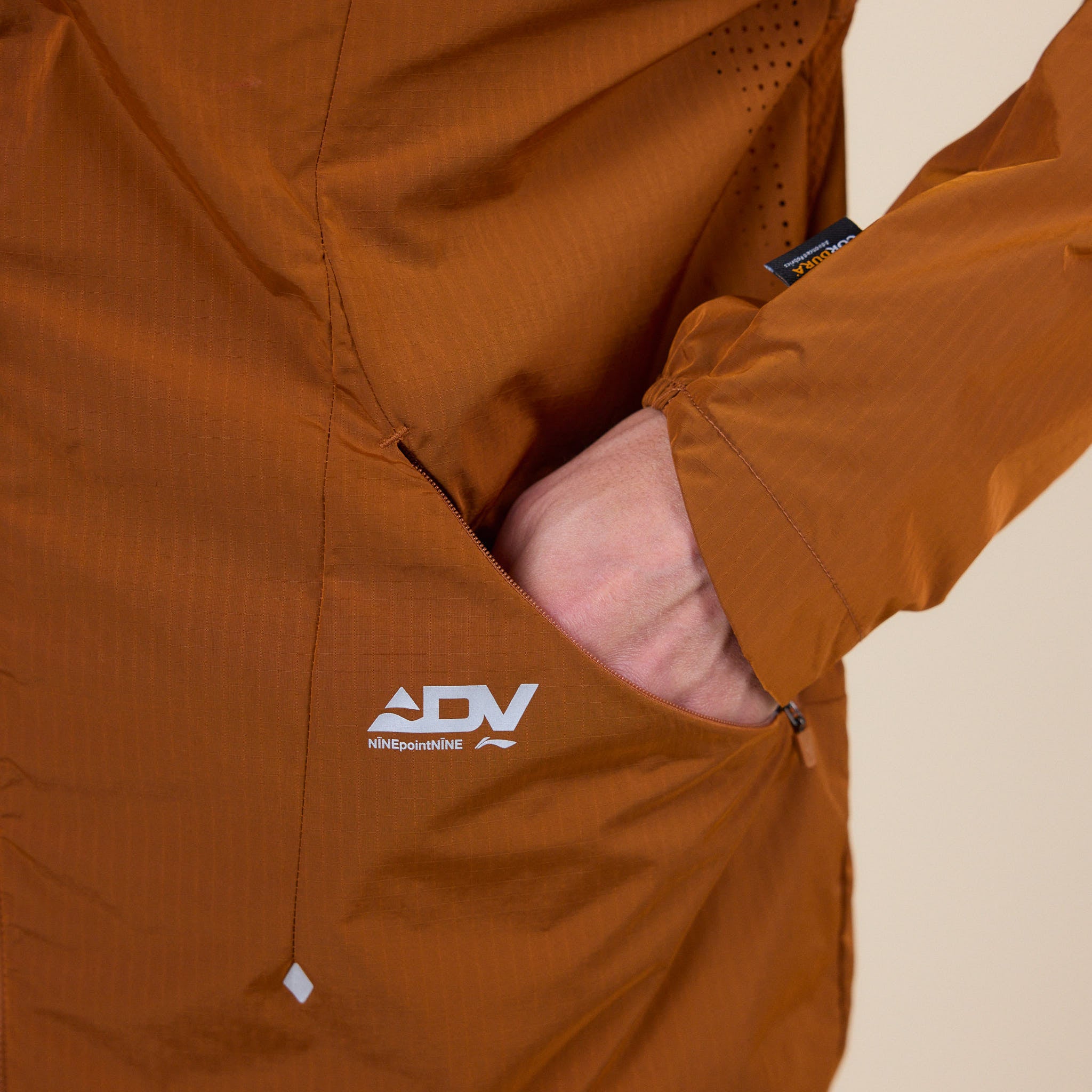 NINEpointNINE x LI-NING - Light Tracker Training Jacket - Dusty Orange