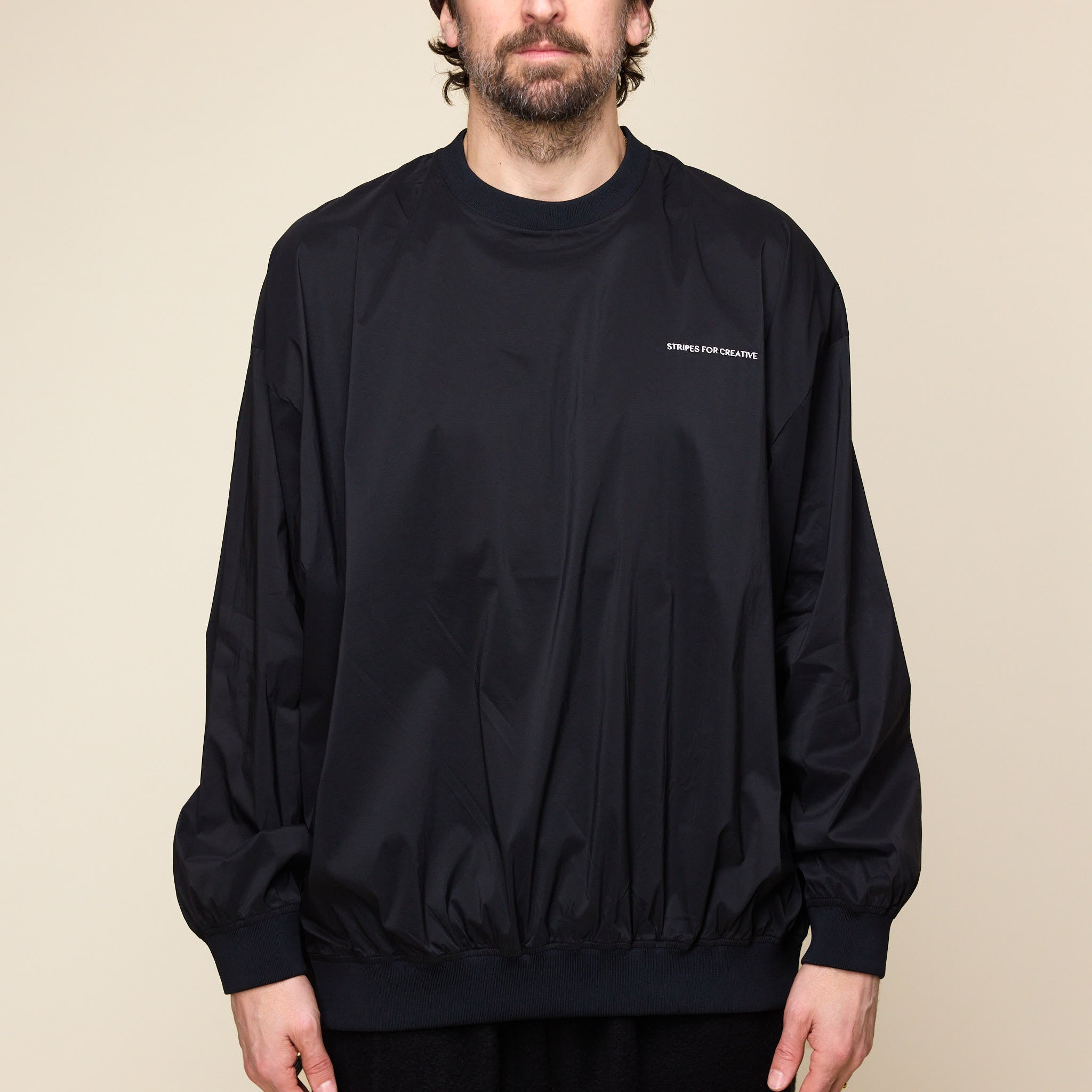 S.F.C Stripes For Creative - Nylon Crew Windbreaker - Black