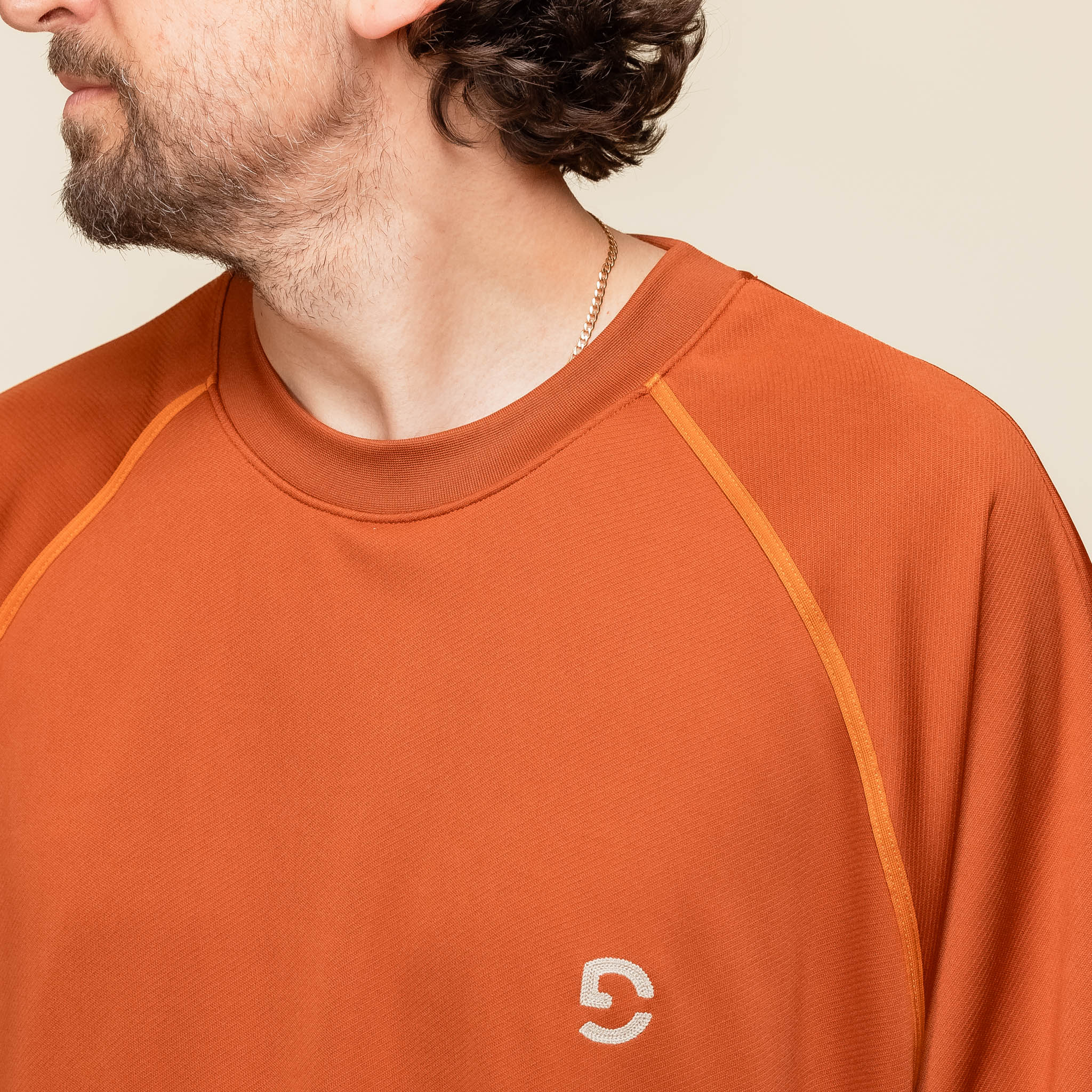 GOOPiMADE - “Rve-T3” Riverside Track Tee - Pumpkin