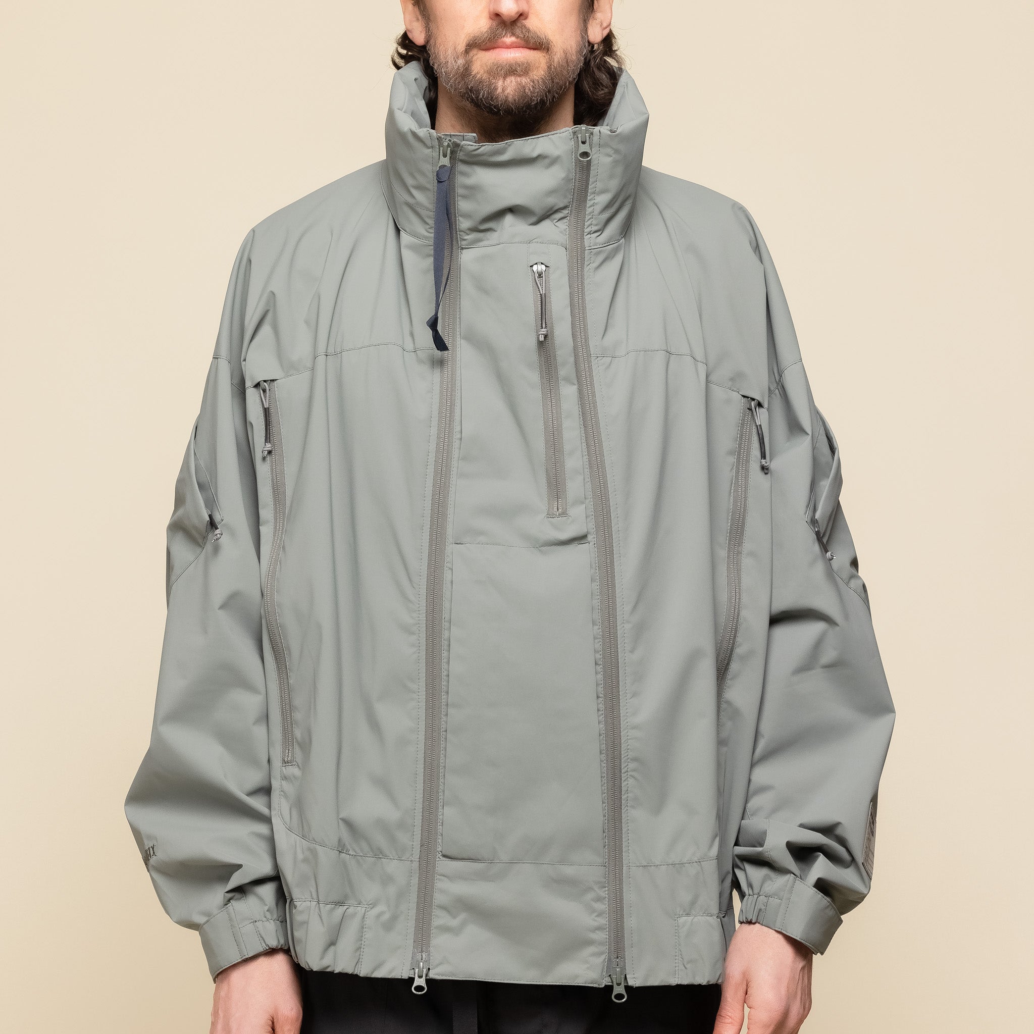 Poliquant - Protected Common Uniform Hooded Jacket - Grey Green "poliquant stockists" "poliquant website" "poliquant jacket"