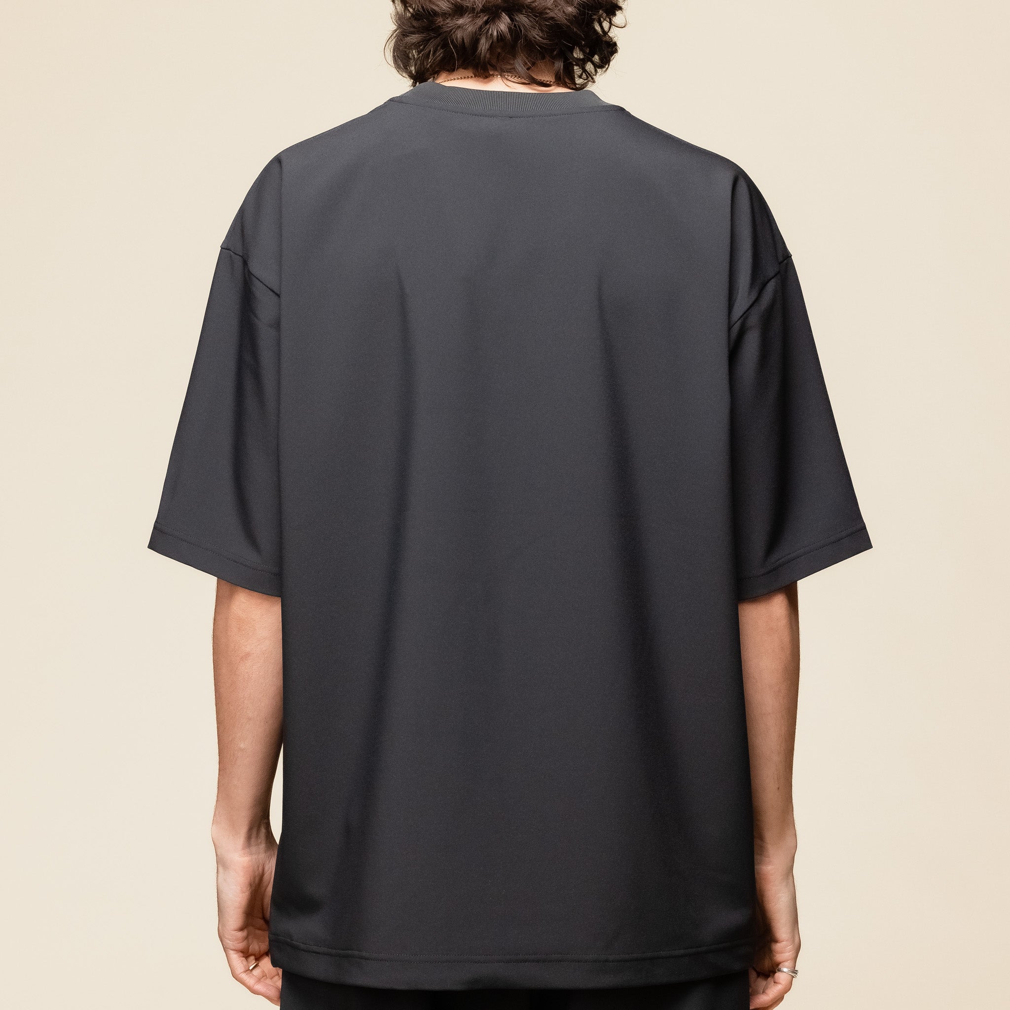 DLMXGA52U Descente IO - Tech Half Sleeve T-Shirt - Black "descente I/O" "descente allterrain" "descente t-shirt"