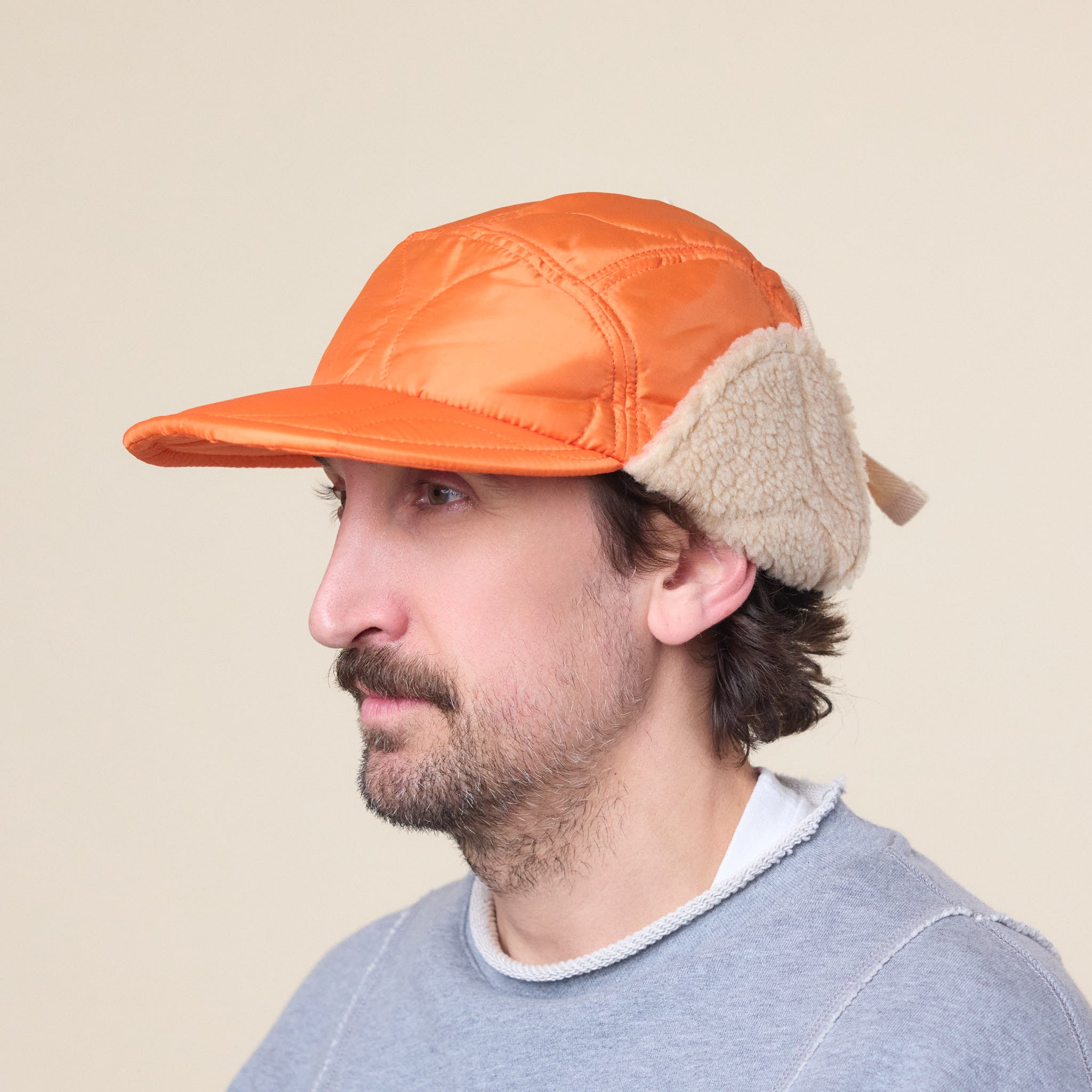 Found Feather - Quilted 1/2 Moon Cap With Ears - Orange