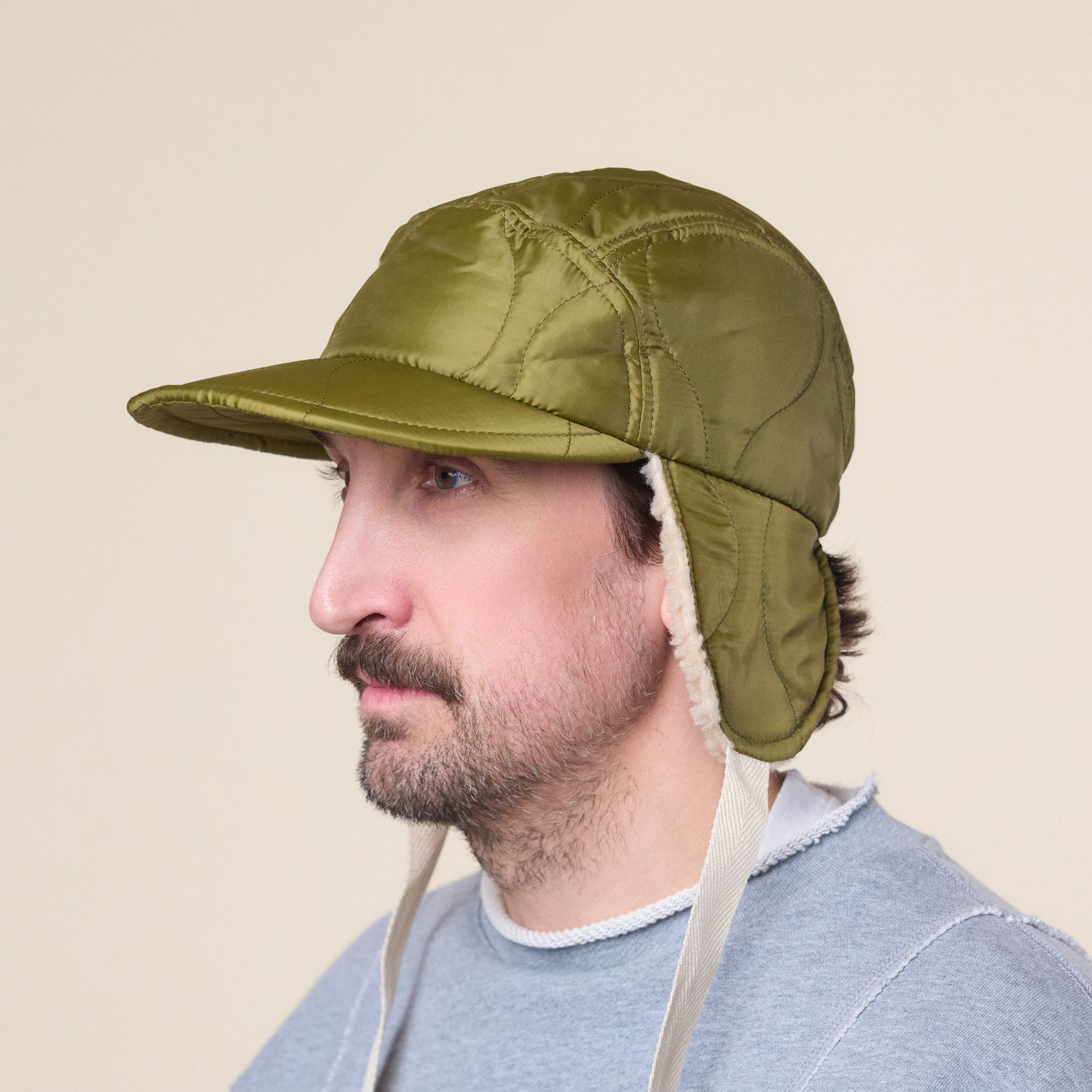 Found Feather - Quilted 1/2 Moon Cap With Ears - Green