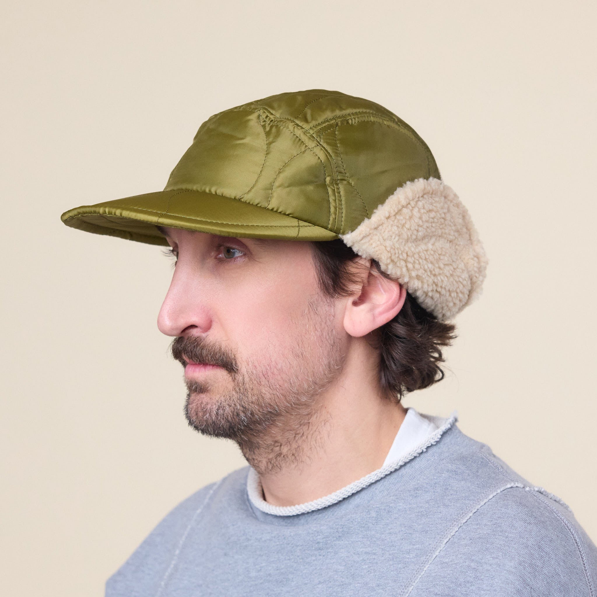 Found Feather - Quilted 1/2 Moon Cap With Ears - Green