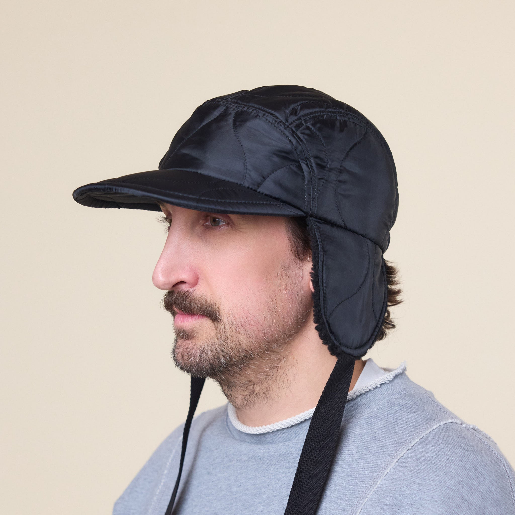 Found Feather - Quilted 1/2 Moon Cap With Ears - Black