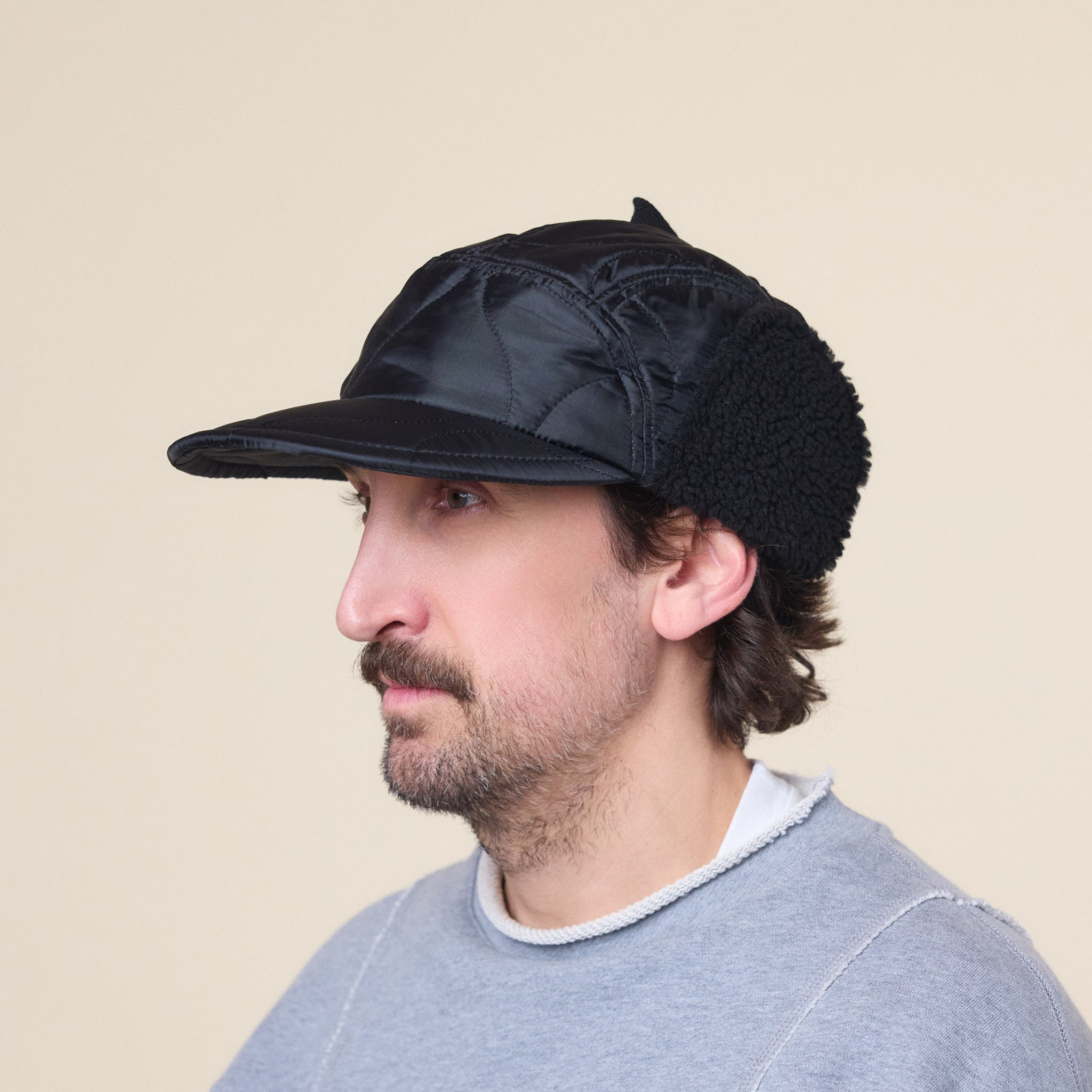 Found Feather - Quilted 1/2 Moon Cap With Ears - Black