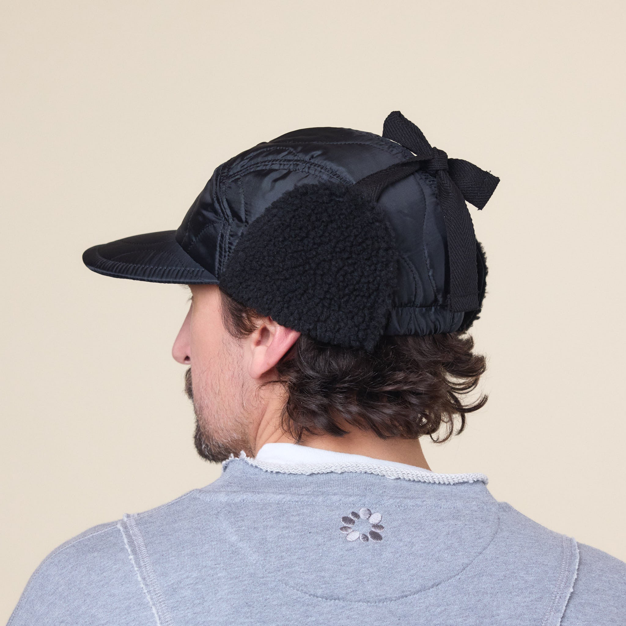 Found Feather - Quilted 1/2 Moon Cap With Ears - Black