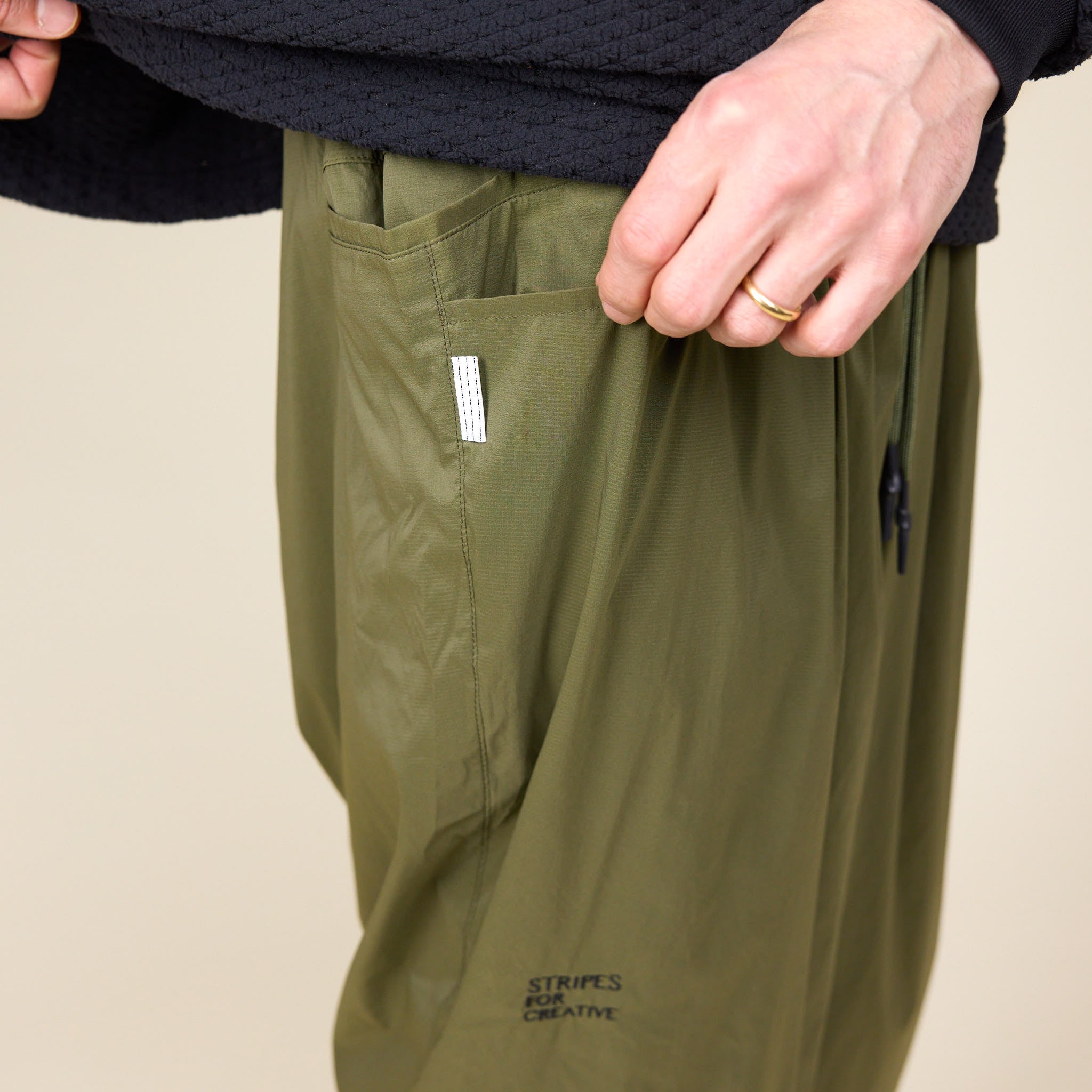 S.F.C Stripes For Creative - Sport Nylon Wide Pants - Olive